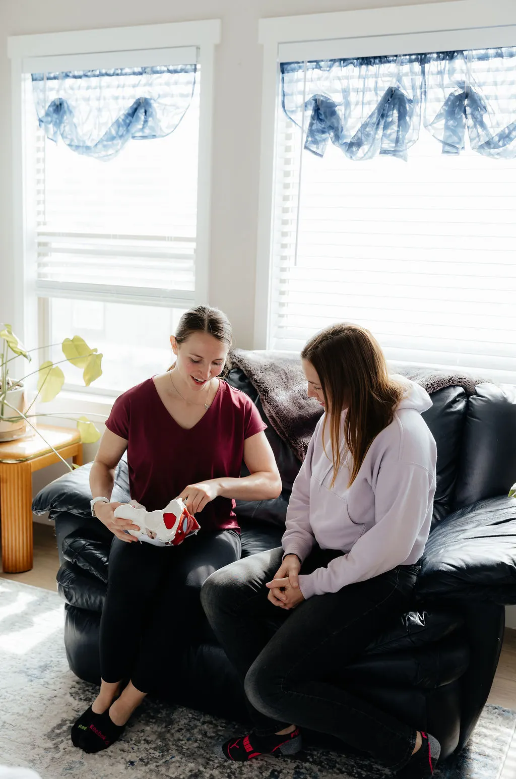 Dr. Danaya providing in-home pelvic floor education